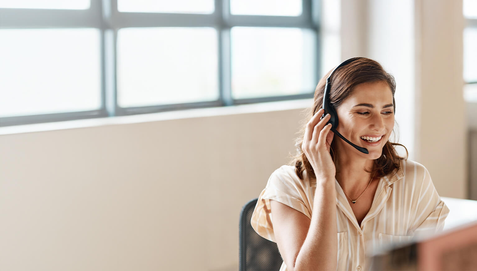 Smiling woman at workplace