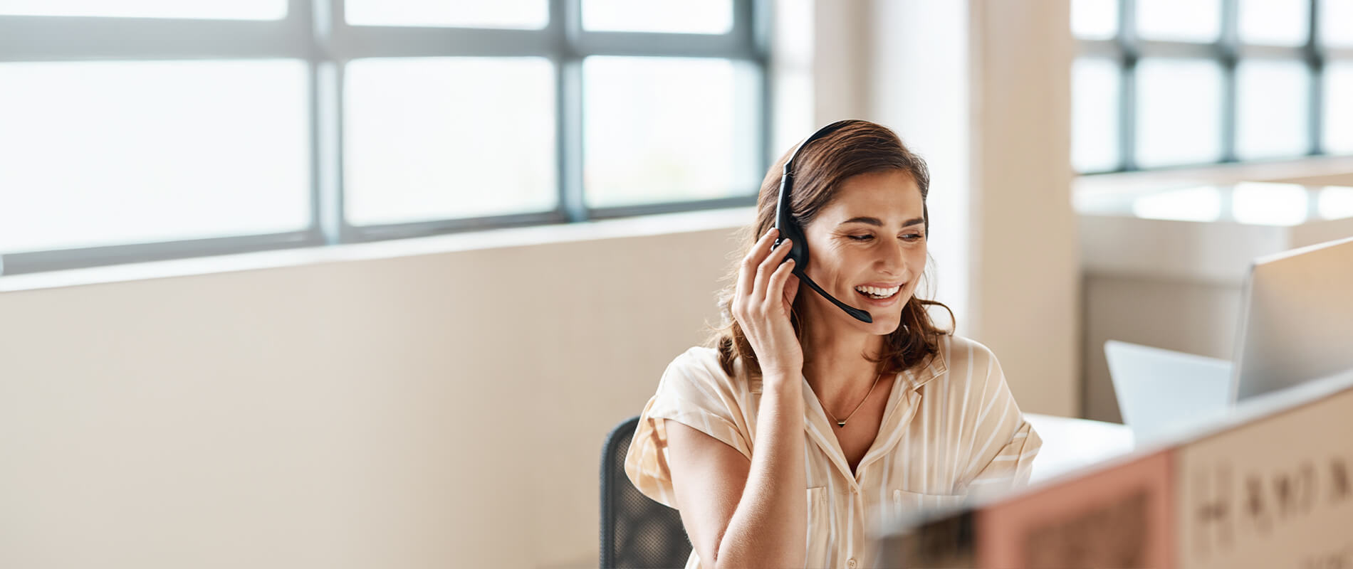 Smiling woman at workplace